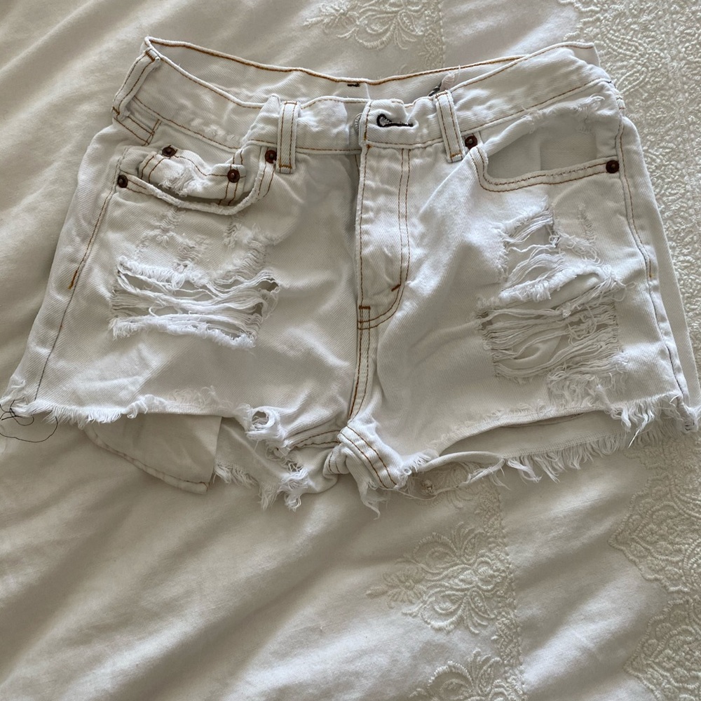 Vintage redistressed Levi white 505 jean shorts